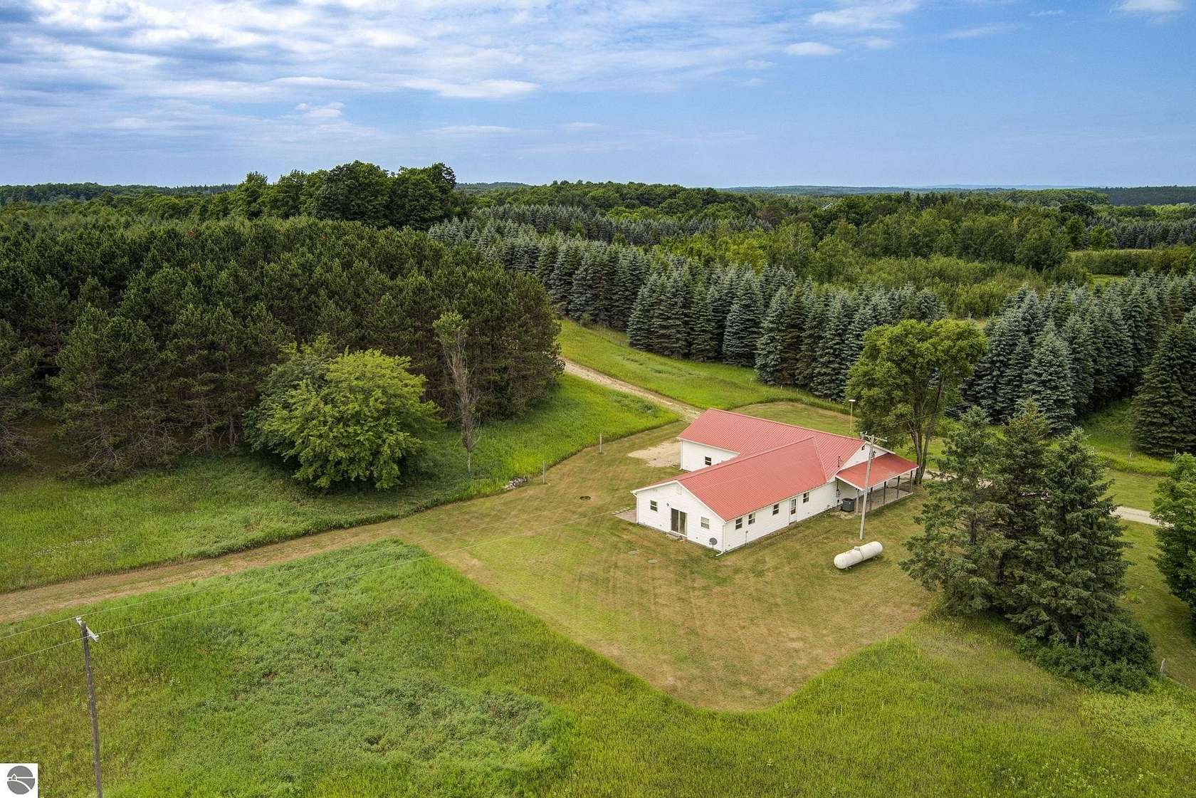 20 Acres of Land with Home for Sale in Kingsley, Michigan