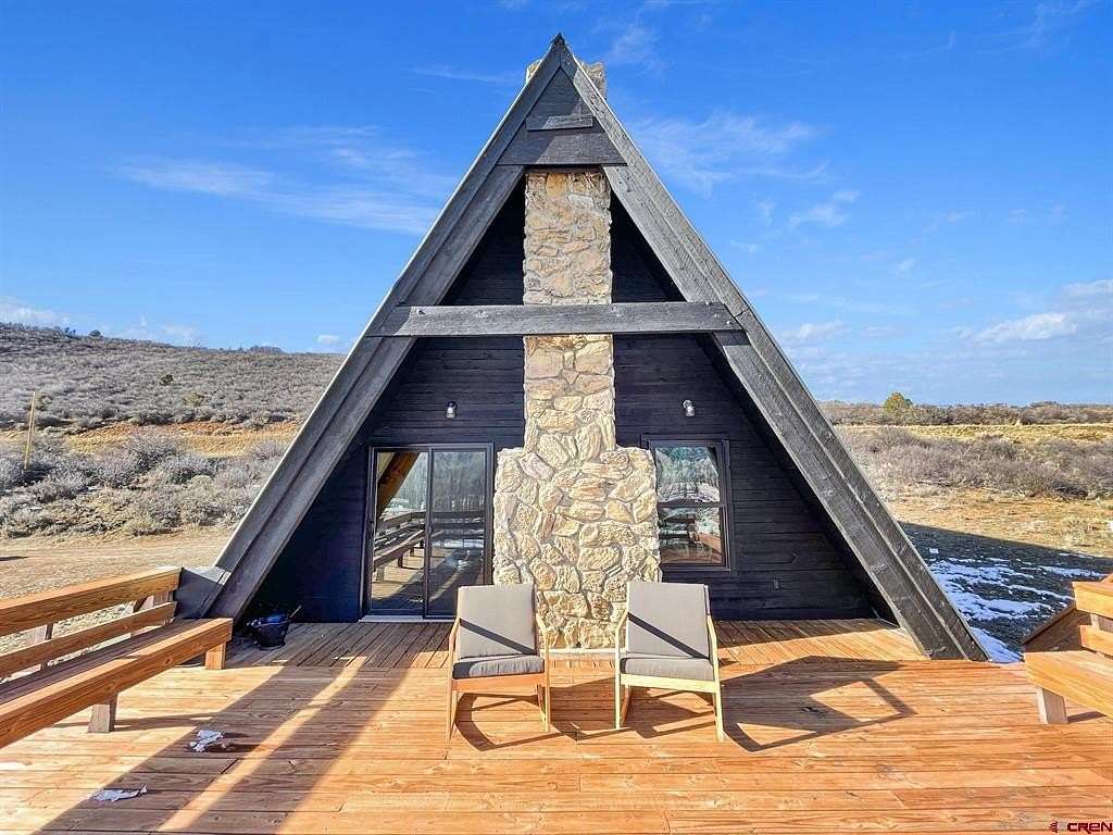 8.6 Acres of Residential Land with Home for Sale in Crawford, Colorado