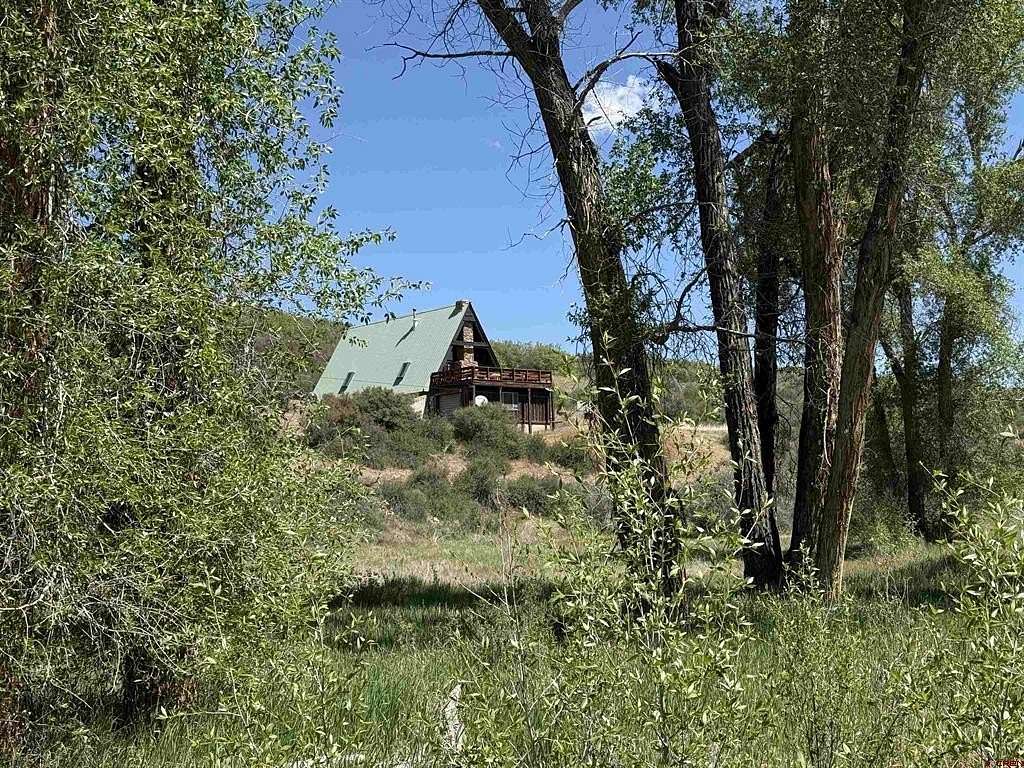 8.6 Acres of Land with Home for Sale in Crawford, Colorado