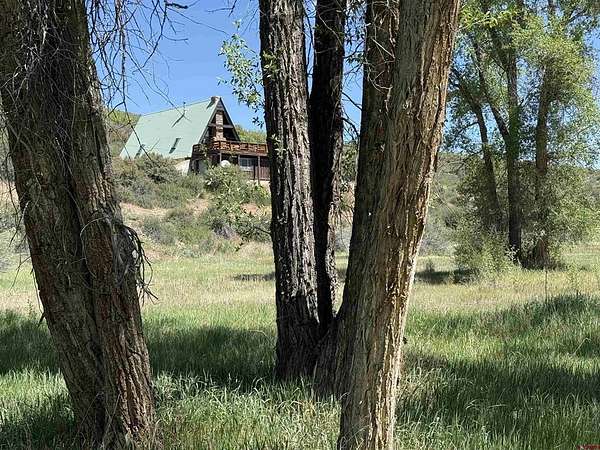 8.6 Acres of Land with Home for Sale in Crawford, Colorado