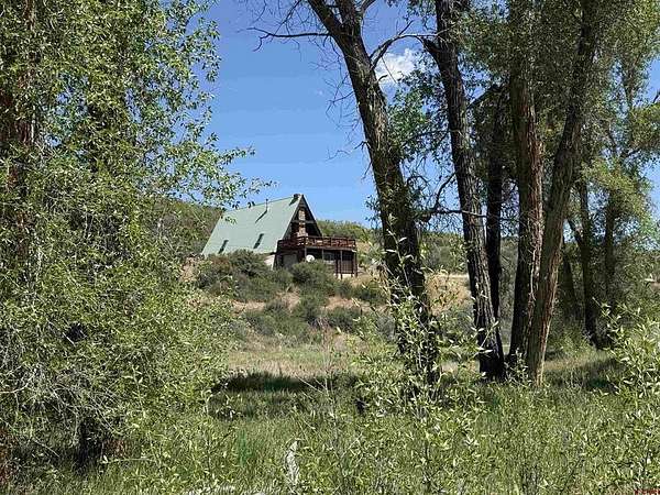 8.6 Acres of Land with Home for Sale in Crawford, Colorado