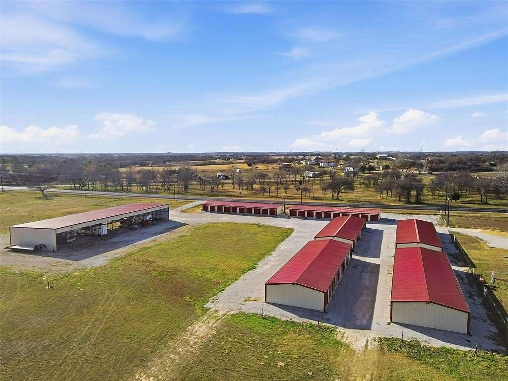 9.58 Acres of Commercial Land for Sale in Poolville, Texas