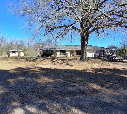 13.2 Acres of Land with Home for Sale in Omaha, Texas
