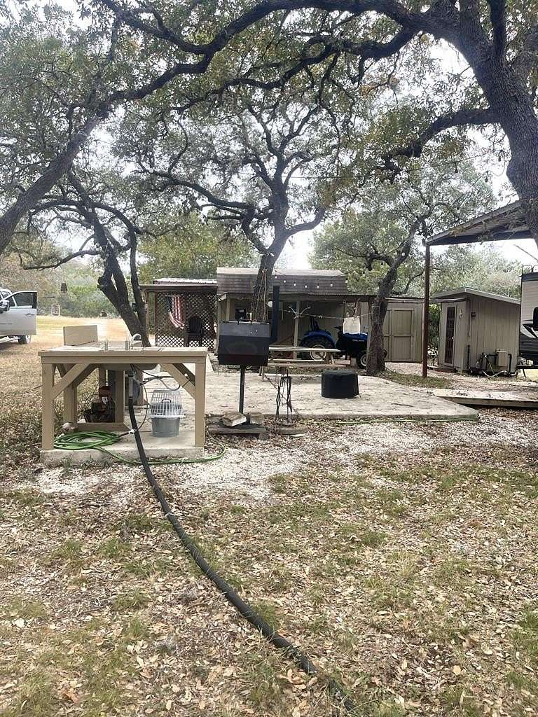 6.62 Acres of Residential Land with Home for Sale in Concan, Texas