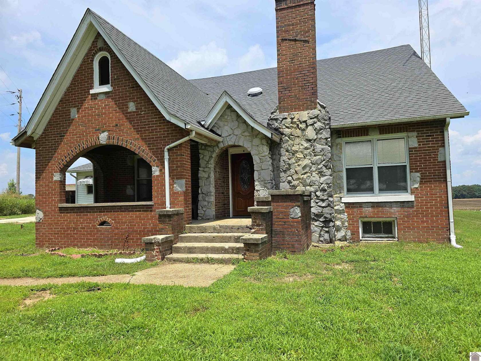 1.5 Acres of Residential Land with Home for Sale in Sedalia, Kentucky