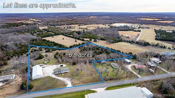 6.8 Acres of Residential Land with Home for Sale in Camdenton, Missouri