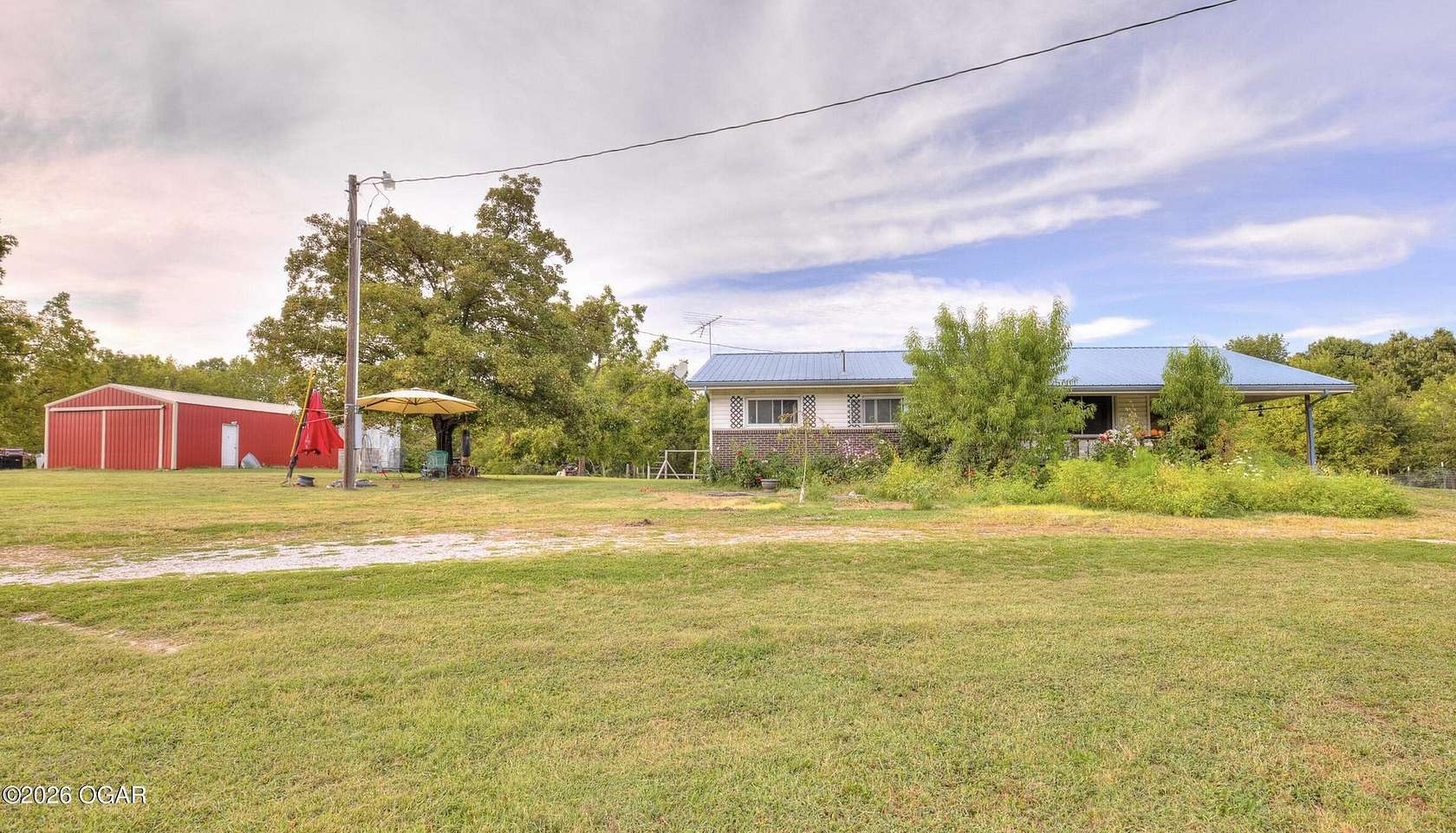 19 Acres of Land with Home for Sale in Anderson, Missouri