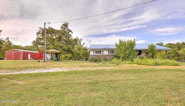 19 Acres of Land with Home for Sale in Anderson, Missouri