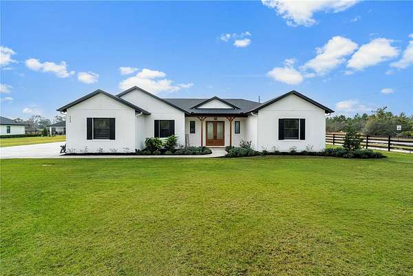 2.12 Acres of Land with Home for Sale in Tavares, Florida