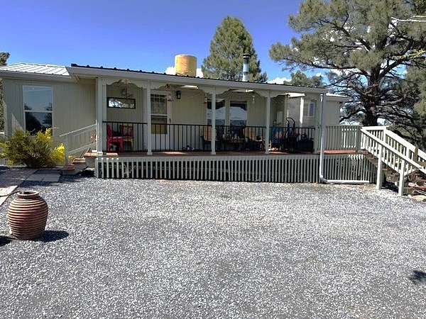 5.12 Acres of Residential Land with Home for Sale in Las Vegas, New Mexico