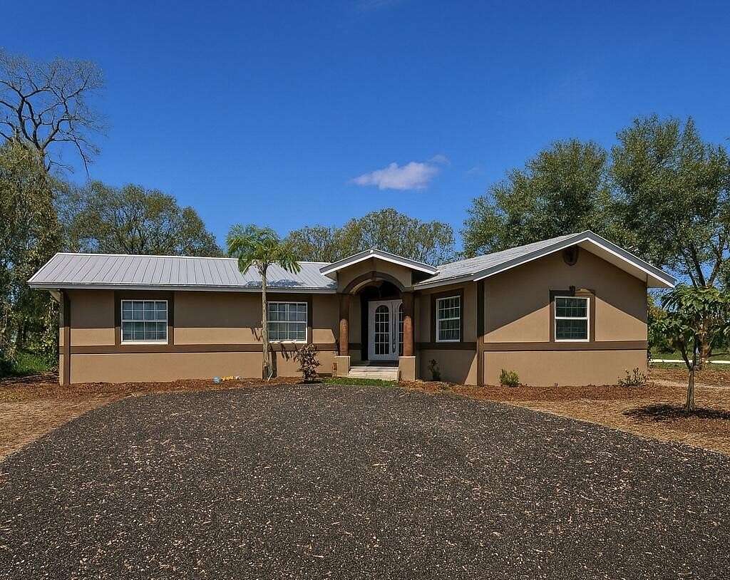 27.7 Acres of Agricultural Land with Home for Sale in LaBelle, Florida