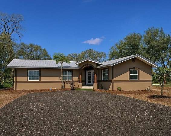 27.7 Acres of Agricultural Land with Home for Sale in LaBelle, Florida