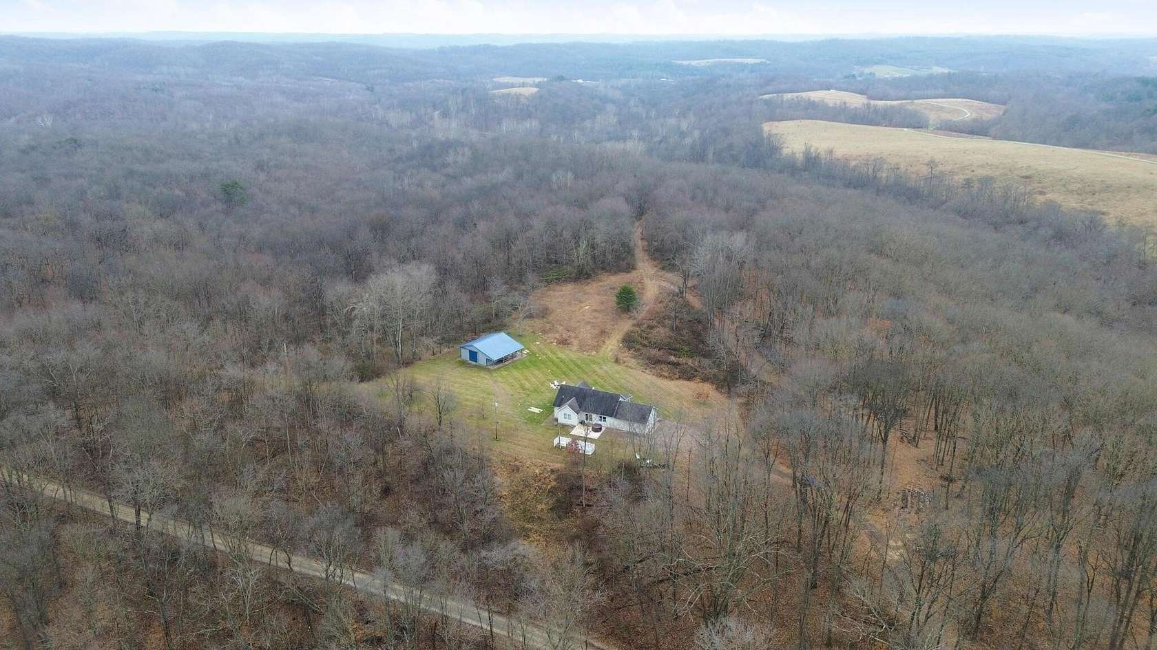 193 Acres of Recreational Land with Home for Sale in McArthur, Ohio