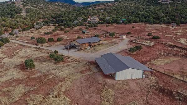 11.7 Acres of Land with Home for Sale in High Rolls, New Mexico