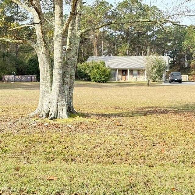 3.8 Acres of Residential Land with Home for Sale in Carriere, Mississippi