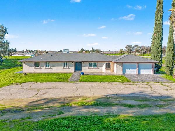 4.1 Acres of Land with Home for Sale in Madera, California
