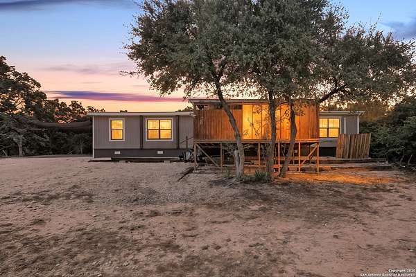 1.6 Acres of Residential Land with Home for Sale in Lakehills, Texas