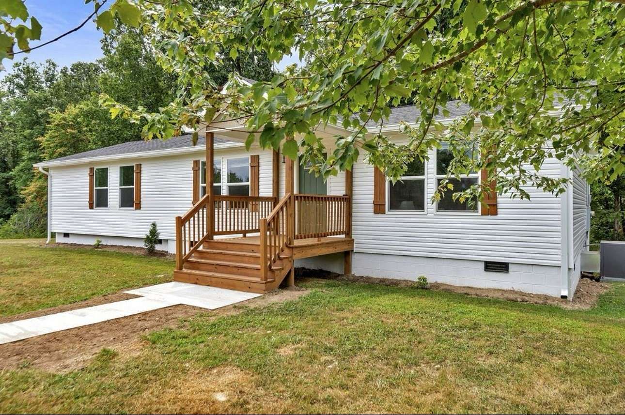 5 Acres of Land with Home for Sale in Bon Aqua, Tennessee