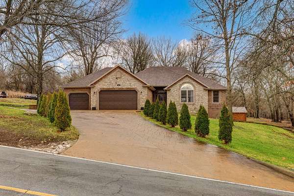 10.7 Acres of Land with Home for Sale in Springfield, Missouri