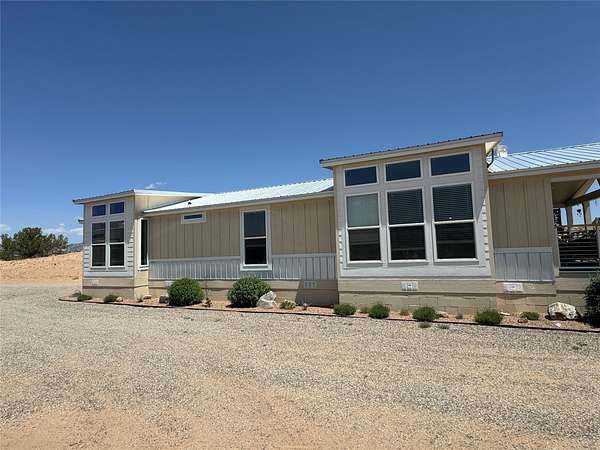 11 Acres of Land with Home for Sale in Medanales, New Mexico