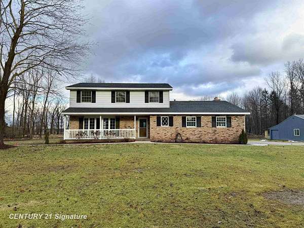 9.2 Acres of Land with Home for Sale in Saginaw, Michigan