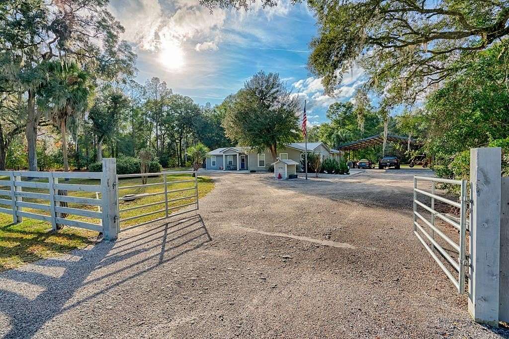 4.5 Acres of Residential Land with Home for Sale in Chiefland, Florida