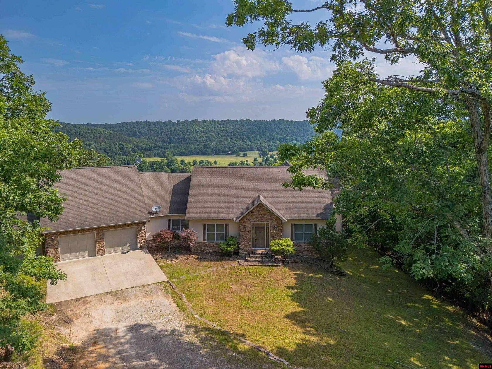 3.27 Acres of Land with Home for Sale in Flippin, Arkansas