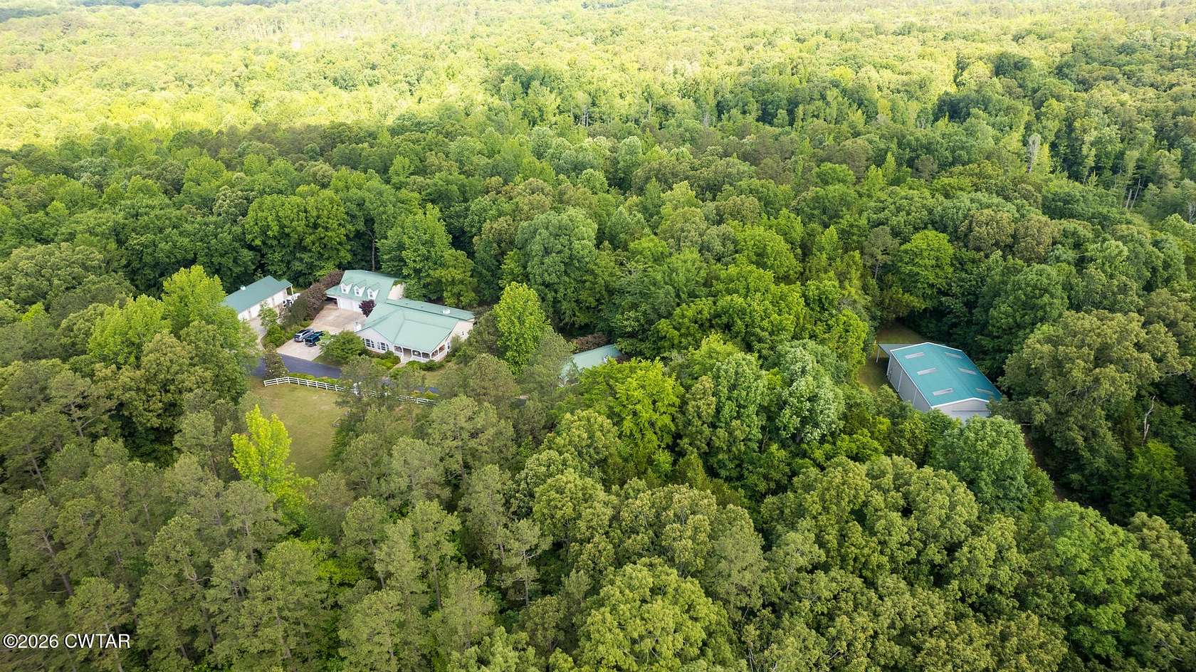 180 Acres of Recreational Land with Home for Sale in Henderson, Tennessee