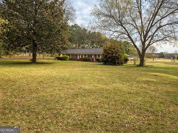 2.59 Acres of Residential Land with Home for Sale in Covington, Georgia