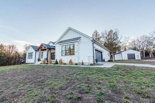 11.5 Acres of Land with Home for Sale in Lebanon, Missouri