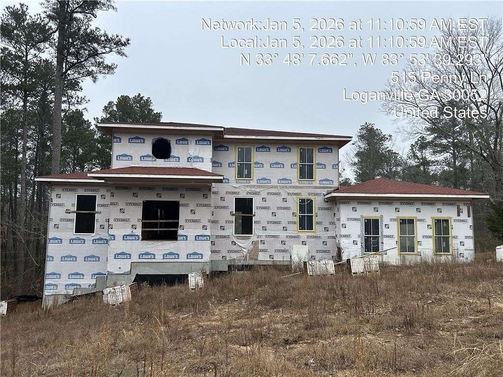 7.28 Acres of Land with Home for Sale in Loganville, Georgia