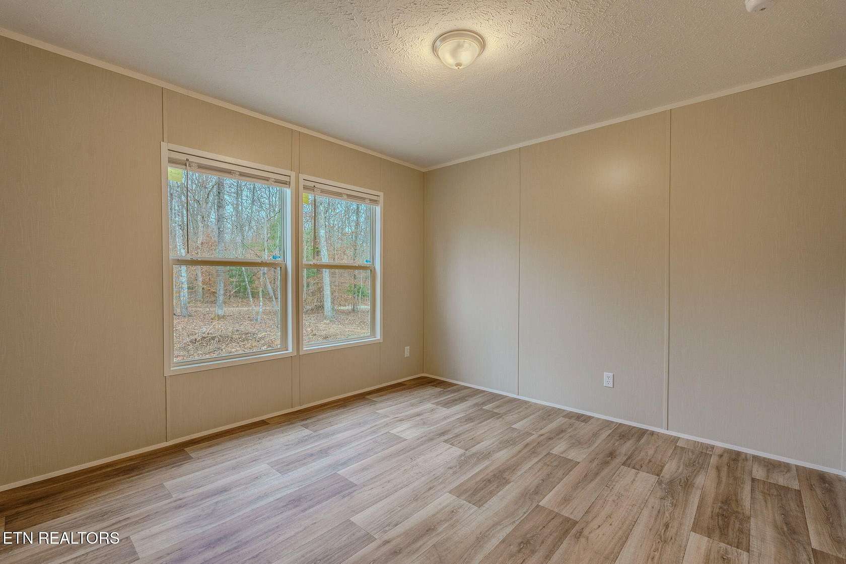 5 Acres of Residential Land with Home for Sale in Lancing, Tennessee