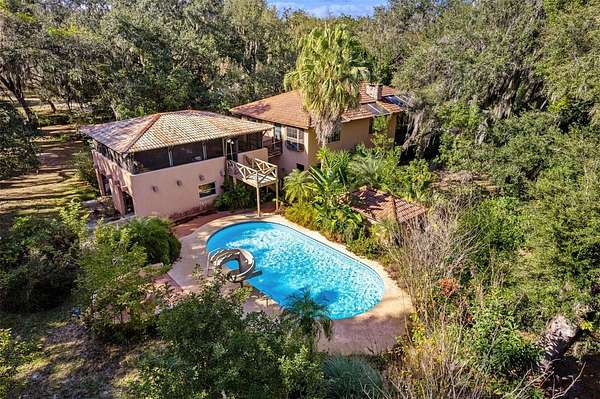 25 Acres of Land with Home for Sale in Okahumpka, Florida