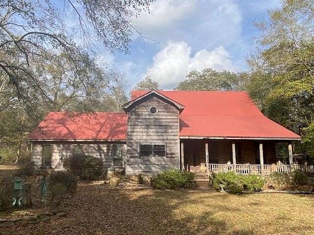 31.7 Acres of Land with Home for Sale in Grand Bay, Alabama