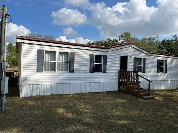 5.2 Acres of Residential Land with Home for Sale in Live Oak, Florida