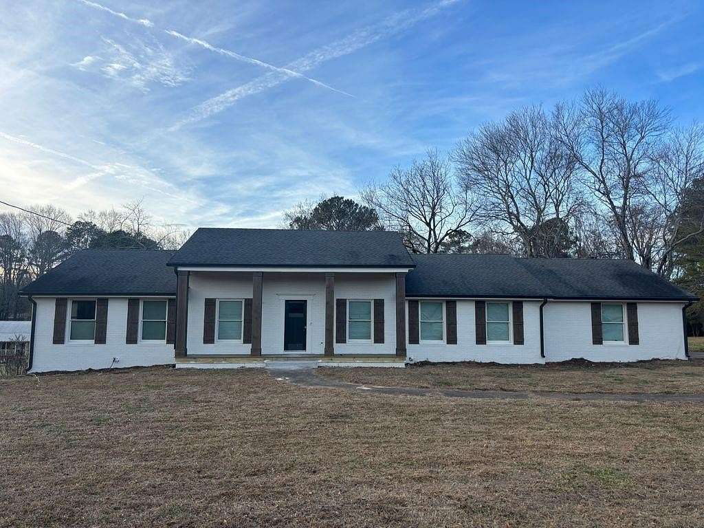 5.12 Acres of Land with Home for Sale in Cumming, Georgia