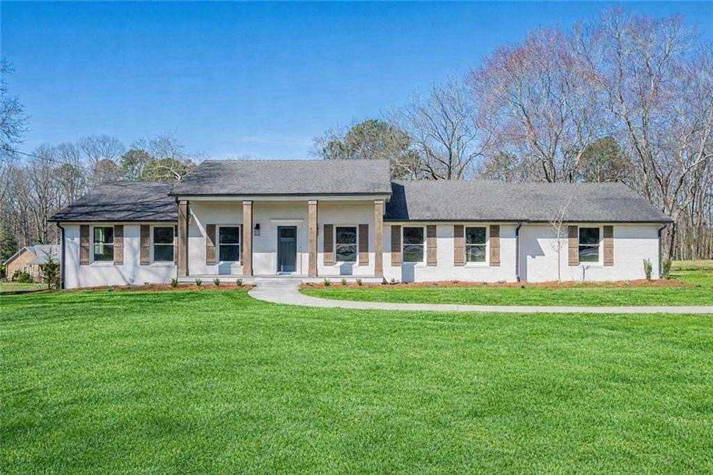 5.12 Acres of Land with Home for Sale in Cumming, Georgia