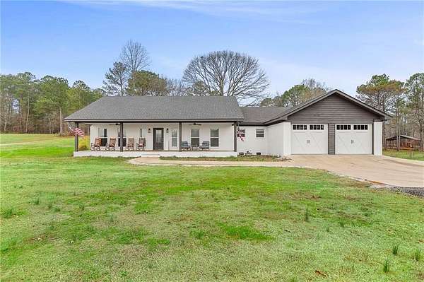 5.6 Acres of Land with Home for Sale in Roanoke, Alabama