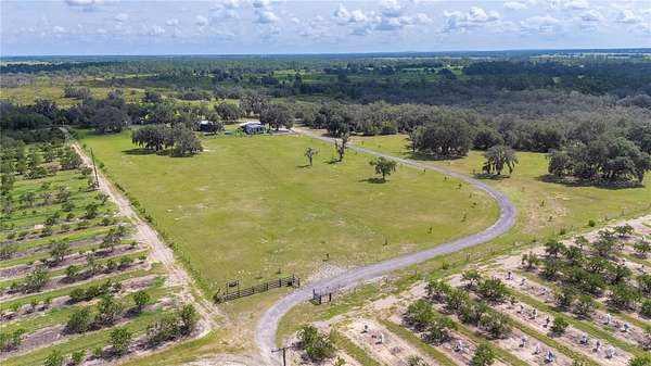 20.1 Acres of Land with Home for Sale in Fort Meade, Florida