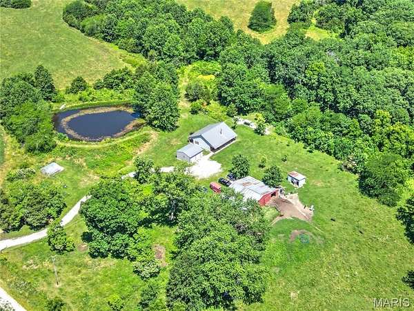 40 Acres of Land with Home for Sale in Curryville, Missouri