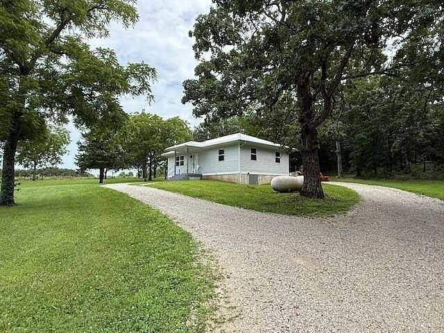 30 Acres of Land with Home for Sale in Flemington, Missouri