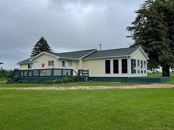 7 Acres of Residential Land with Home for Sale in Burlington Township, Michigan