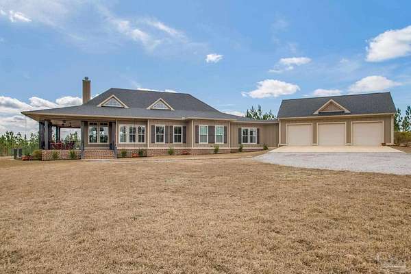 5 Acres of Residential Land with Home for Sale in Pace, Florida