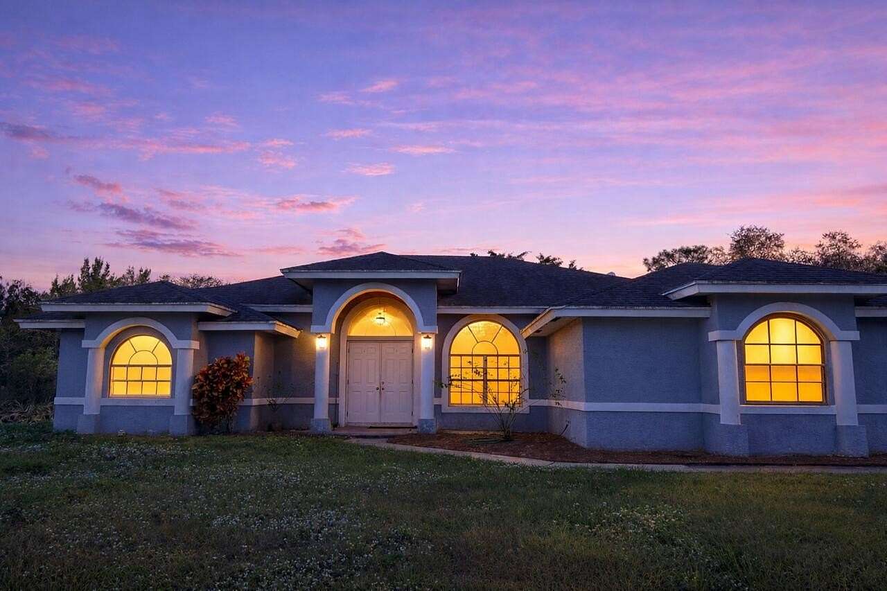 5.2 Acres of Land with Home for Sale in The Acreage, Florida