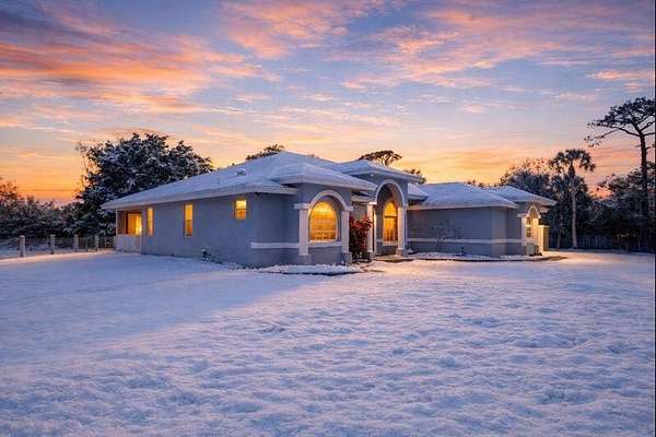 5.2 Acres of Land with Home for Sale in The Acreage, Florida