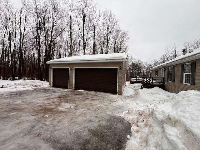 9 Acres of Residential Land with Home for Sale in Levering, Michigan