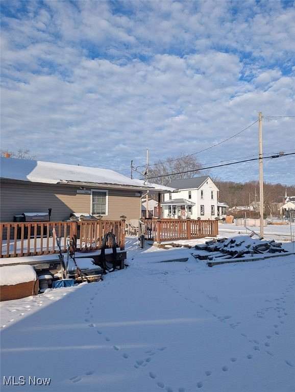 1.77 Acres of Residential Land with Home for Auction in Robertsville, Ohio