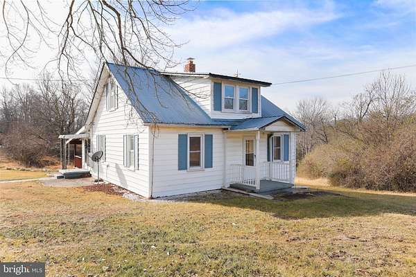 5.86 Acres of Residential Land with Home for Sale in Berkeley Springs, West Virginia