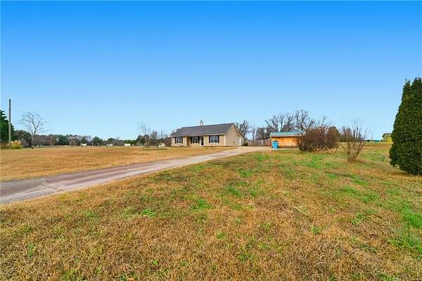 1.54 Acres of Residential Land with Home for Sale in Locust Grove, Georgia