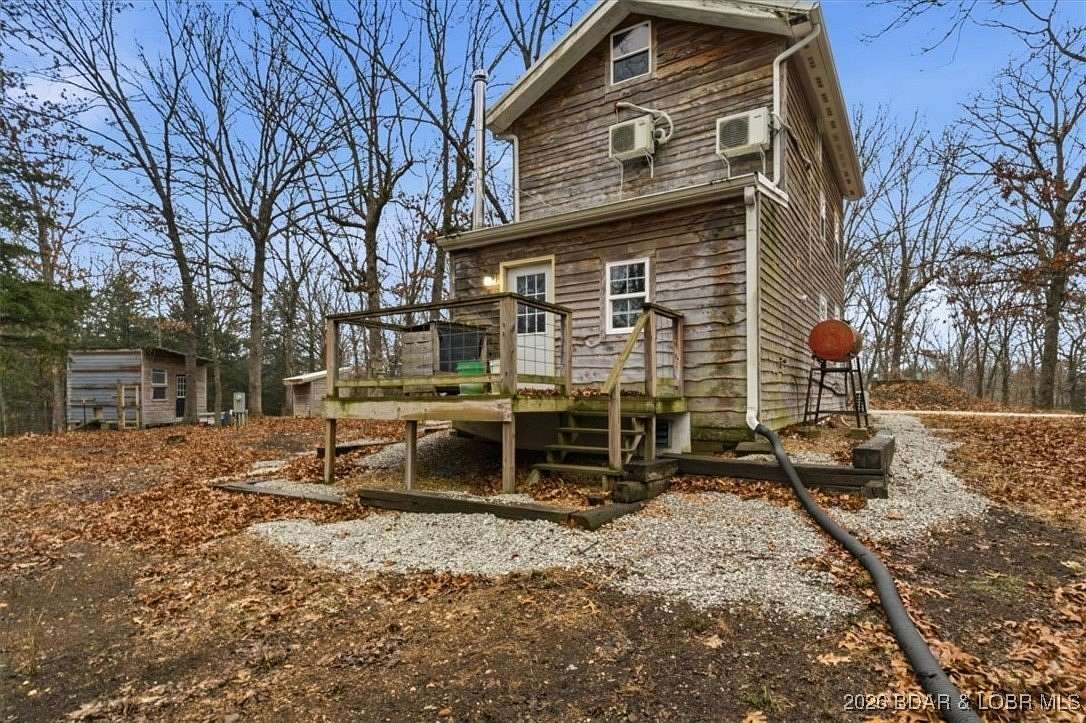 10 Acres of Land with Home for Sale in Cole Camp, Missouri